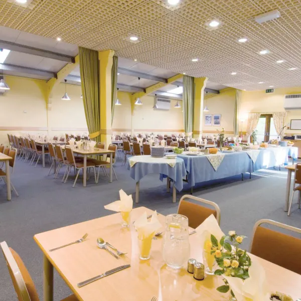 The dining room laid for a celebration meal