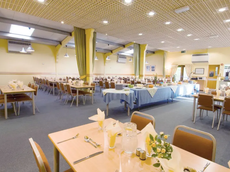 The dining room laid for a celebration meal
