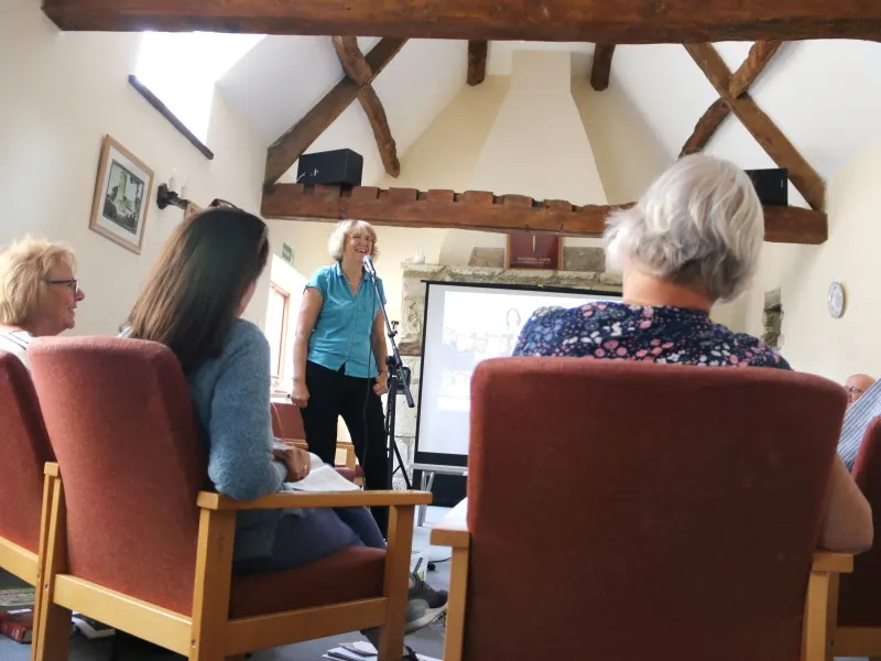 A meeting in the stone barn