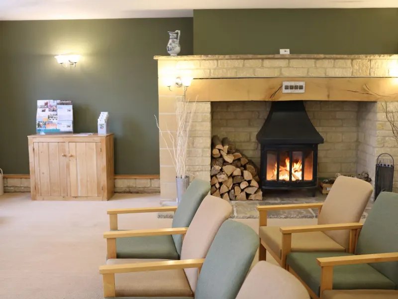 The inglenook fireplace in the Wellspring lounge