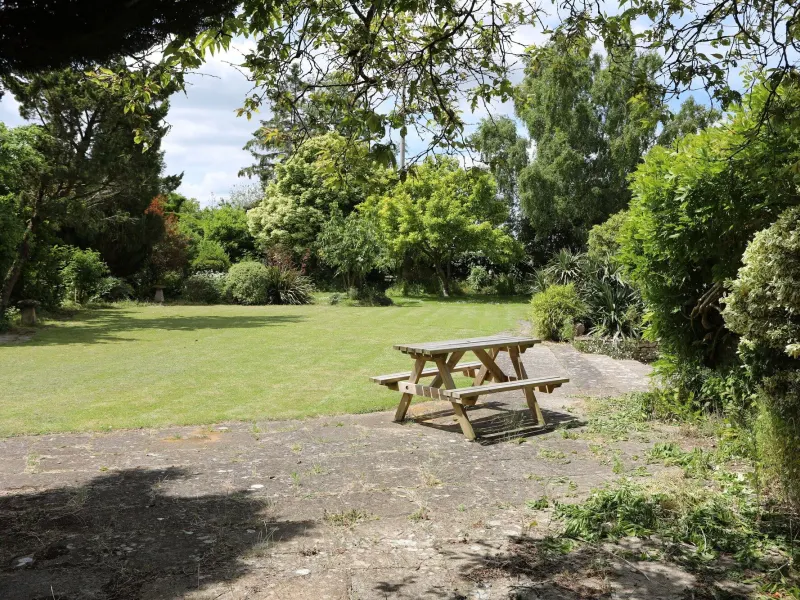 Picnic tables in the private garden
