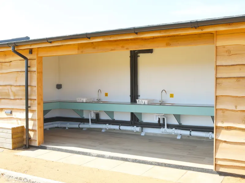 The open-sided wash-up kitchen for campers
