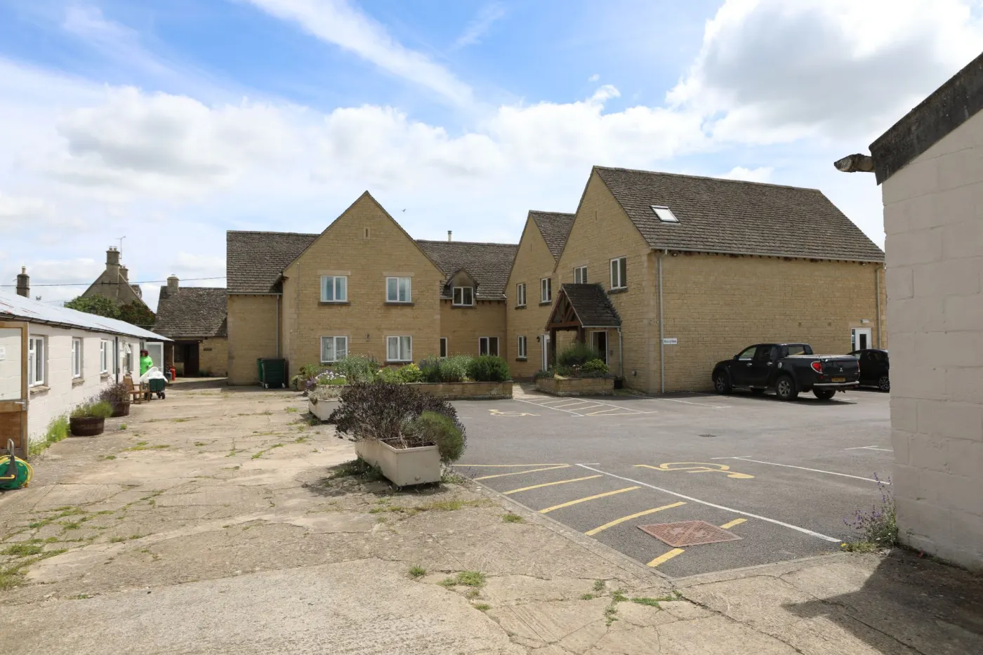 Wellspring’s entrance, with Blue Badge bays marked in the car park right outside