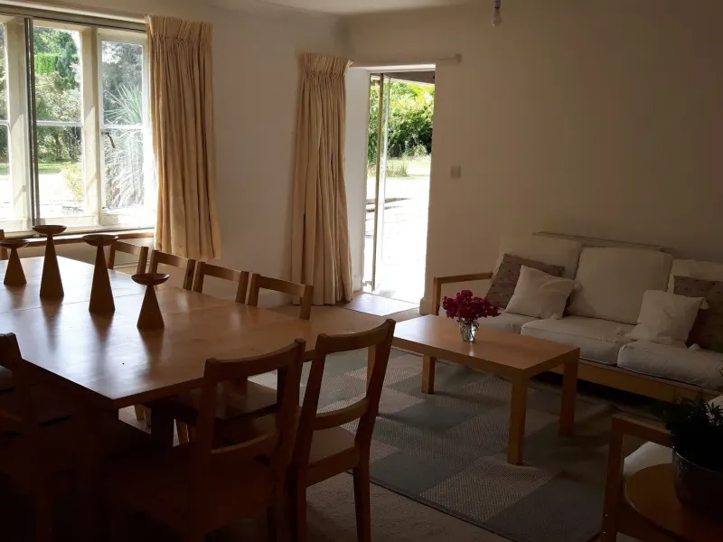 The dining room opens onto the garden